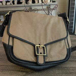 Medium sized cloth and leather crossbody.